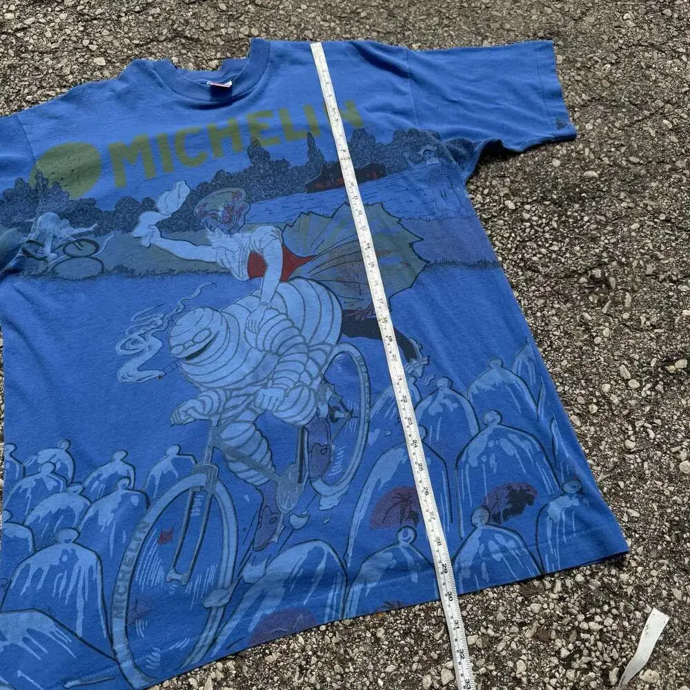 Vintage 90s Michelin Man All Over Print Graphic T-Shirt
